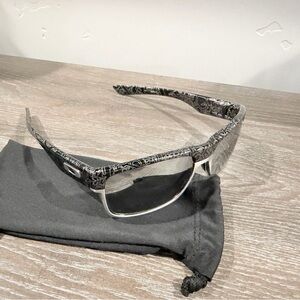 Oakley Black and Silver two faced  sun Glasses